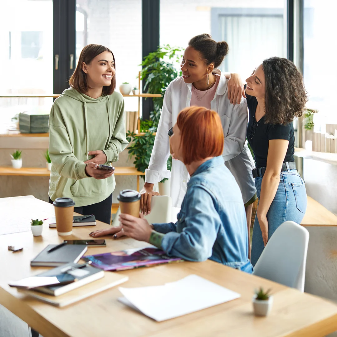 Coworkers Sharing A Casual Team Moment In Office