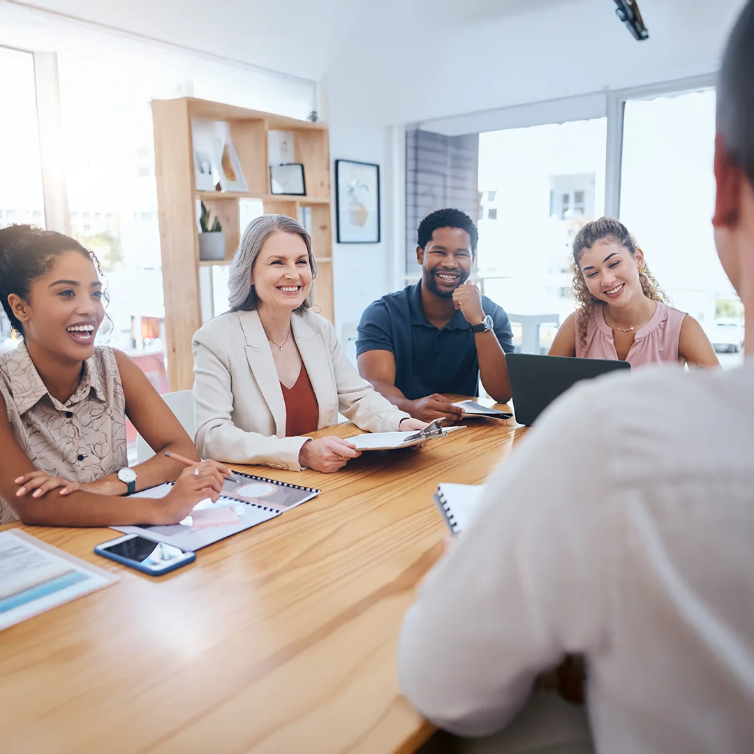 Diverse Team Meeting In A Modern Office Setting